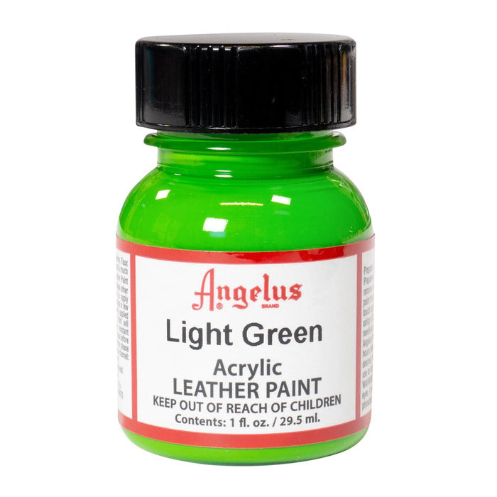 A small bottle of Angelus brand leather paint labeled "Light Green" containing 1 fl. oz. (29.5 ml) of acrylic paint. The label advises to keep out of reach of children.
