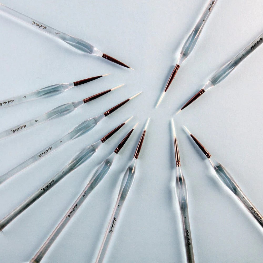 All 11 detail brushes displayed outside the container