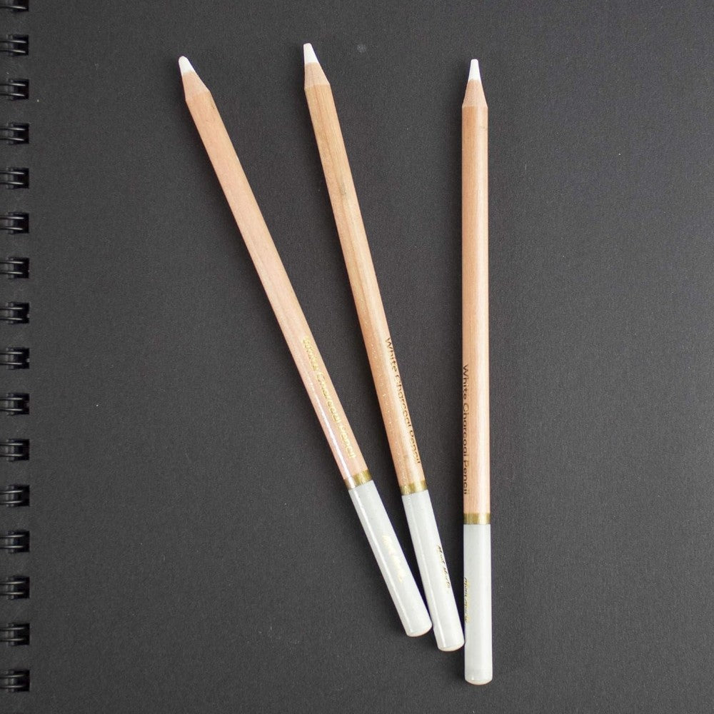 White Charcoal Pencils from Mont Marte Displayed Outside Packaging