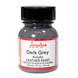 A small bottle of Angelus brand leather paint labeled "Dark Grey" containing 1 fl. oz. (29.5 ml) of acrylic paint. The label advises to keep out of reach of children.  