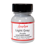 A small bottle of Angelus brand leather paint labeled "Light Grey" containing 1 fl. oz. (29.5 ml) of acrylic paint. The label advises to keep out of reach of children.  
