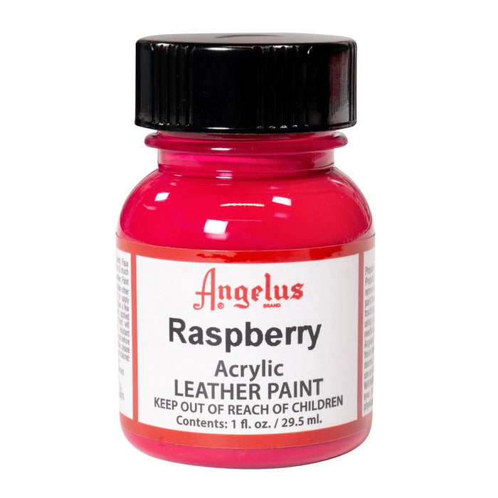 A small bottle of Angelus brand leather paint labeled "Raspberry" containing 1 fl. oz. (29.5 ml) of acrylic paint. The label advises to keep out of reach of children.  